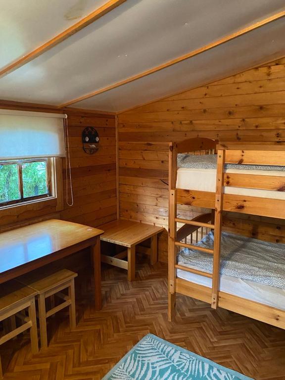 Voodi või voodid majutusasutuse Kuru Guest House toas