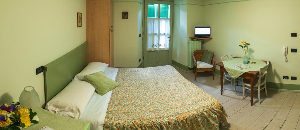 Postel nebo postele na pokoji v ubytování Agriturismo Maso Giomo
