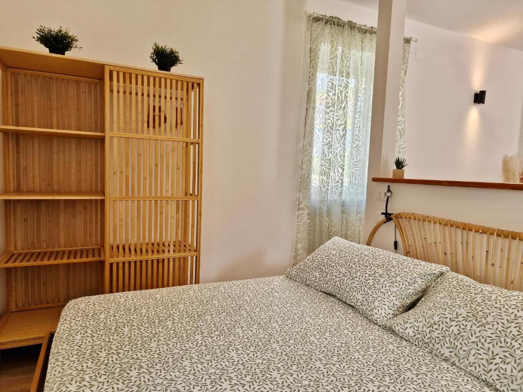 Posteľ alebo postele v izbe v ubytovaní TraMonti Apartments