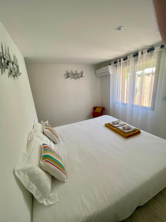 Postel nebo postele na pokoji v ubytování Oustal Magnolia