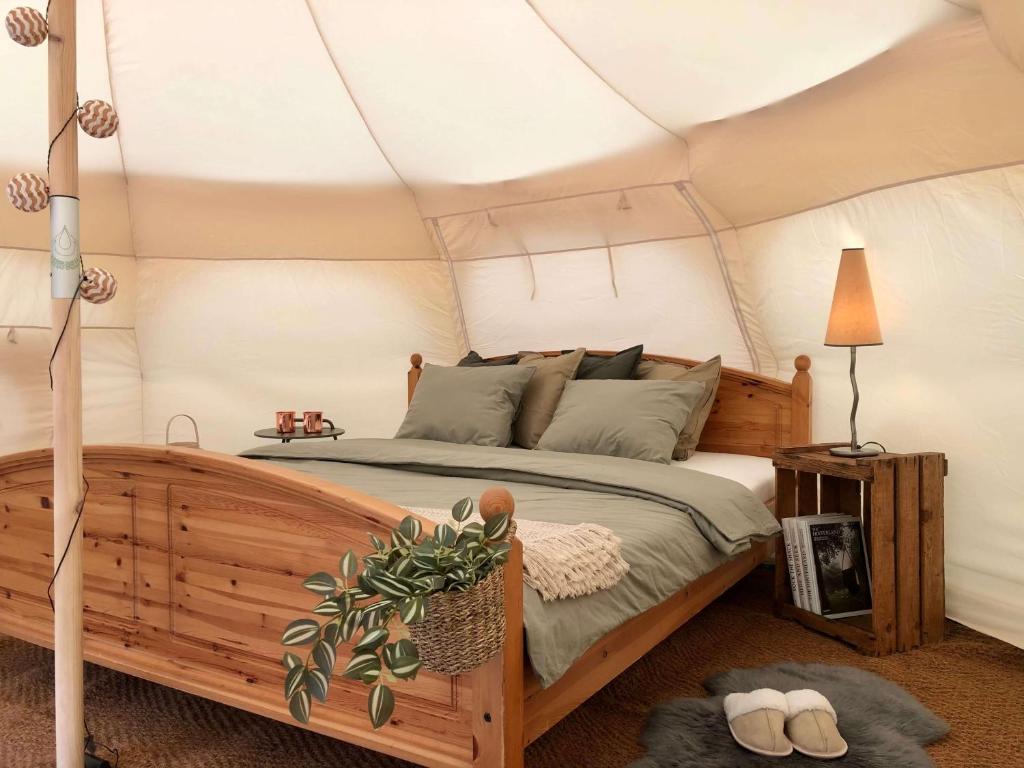 Postel nebo postele na pokoji v ubytování Camping & Ferienunterkünfte Steinplatte