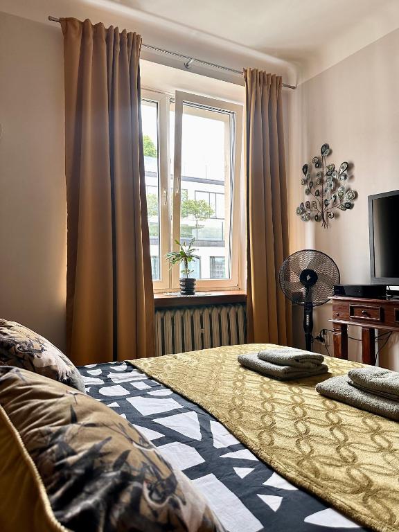 Posteľ alebo postele v izbe v ubytovaní Africa Apartment