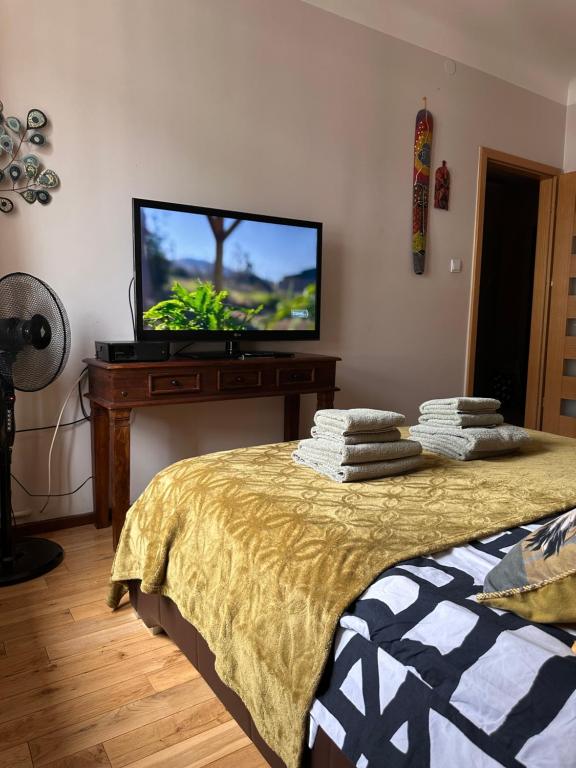 Posteľ alebo postele v izbe v ubytovaní Africa Apartment
