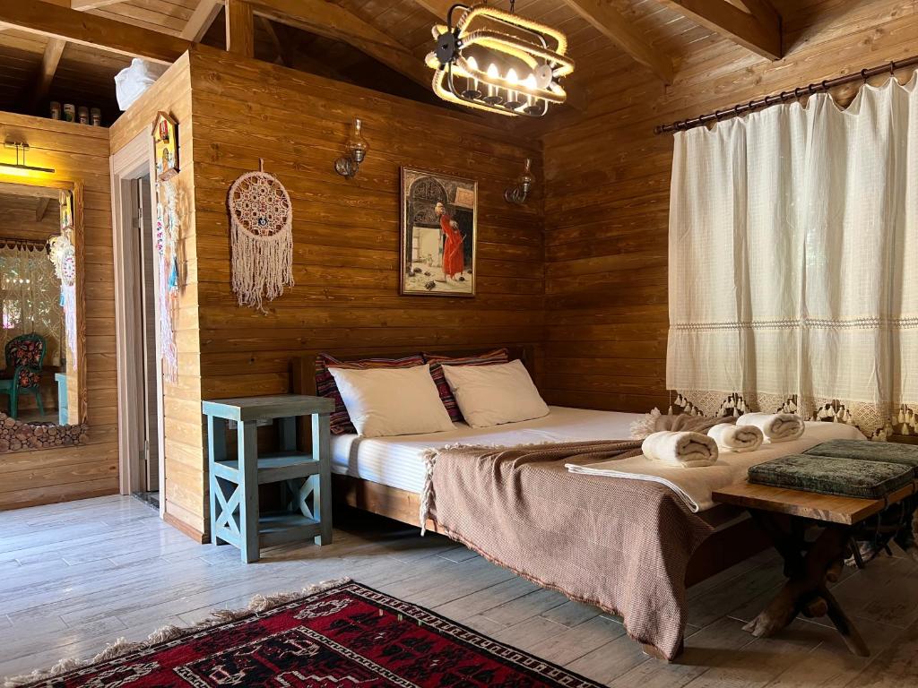 Postel nebo postele na pokoji v ubytování ALAÇATI XL LUXURY HOTEL
