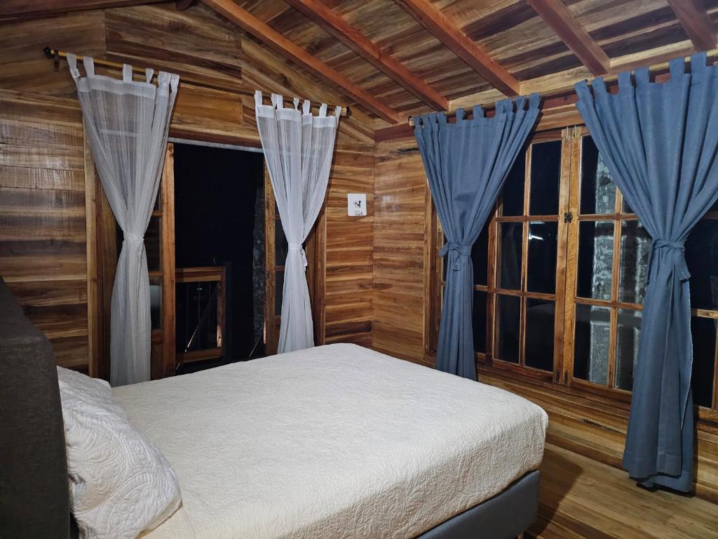 Cama o camas de una habitación en Cattaleya Eco