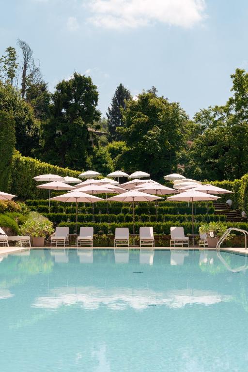 Bazén v ubytování Red's Redaelli Hotel nebo v jeho okolí
