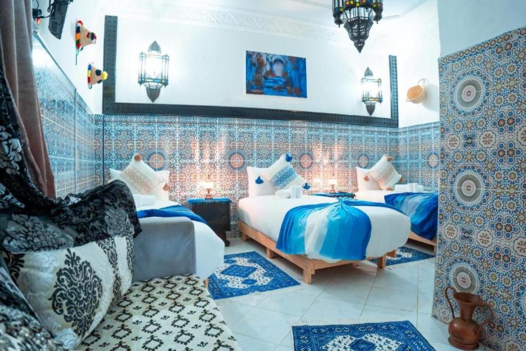 Postel nebo postele na pokoji v ubytování Dar Chefchaouen - Akchour Room