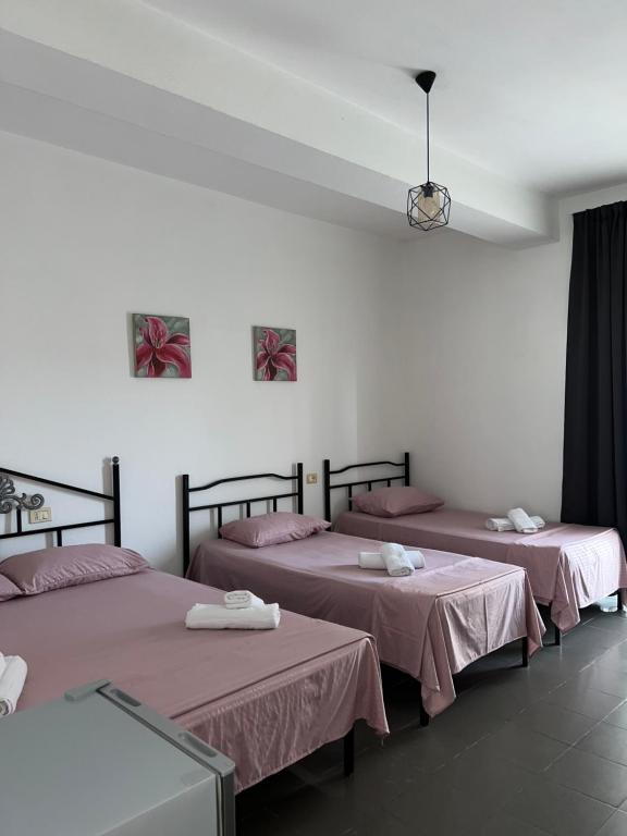 Postel nebo postele na pokoji v ubytování Guest House L&B