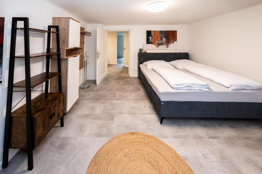 Postel nebo postele na pokoji v ubytování L&P Appartement Klagenfurt