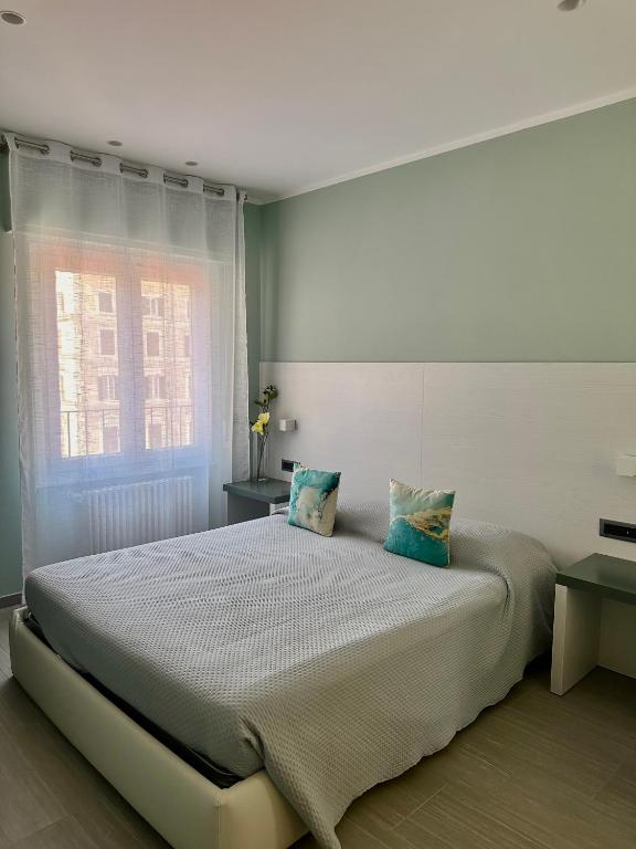 Postel nebo postele na pokoji v ubytování Real Rooms Dalia
