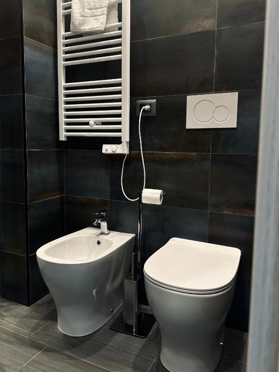 Koupelna v ubytování Real Rooms Dalia