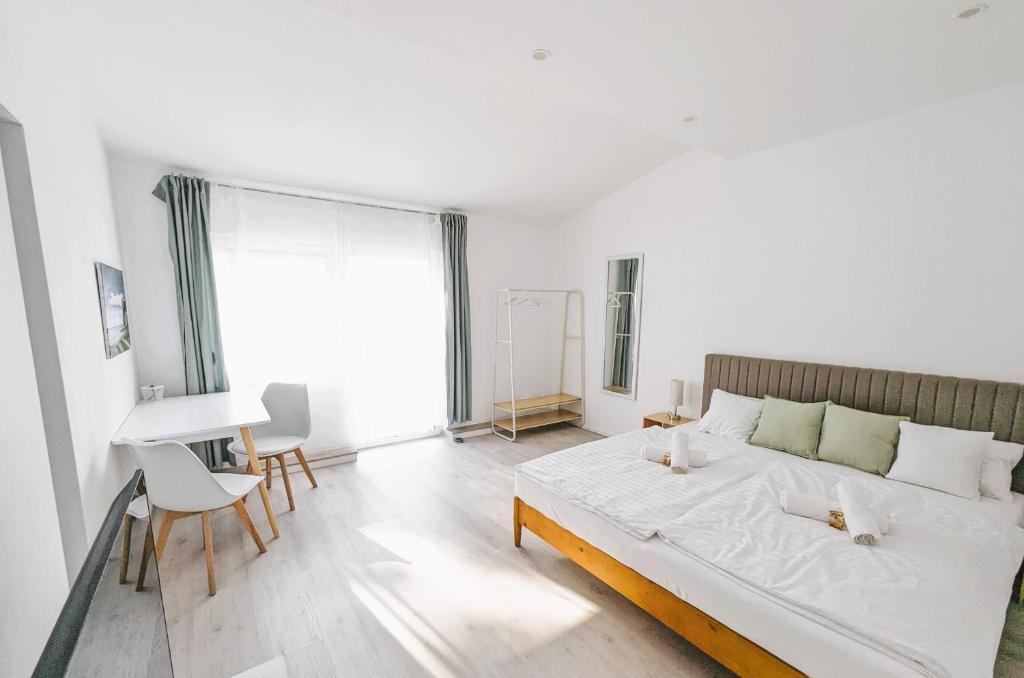 Postel nebo postele na pokoji v ubytování Apartment Nähe Airbus