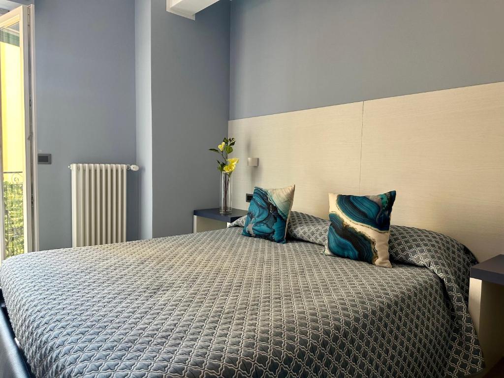 Postel nebo postele na pokoji v ubytování Real Rooms Dalia