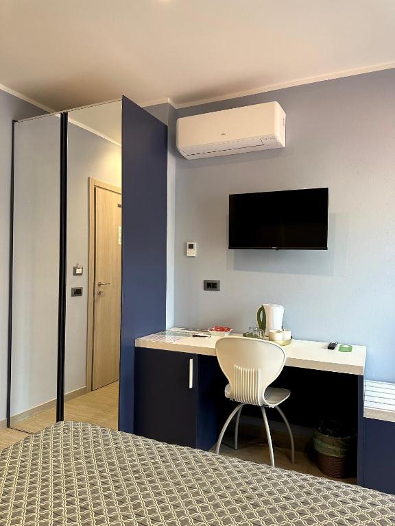 TV a/nebo společenská místnost v ubytování Real Rooms Dalia