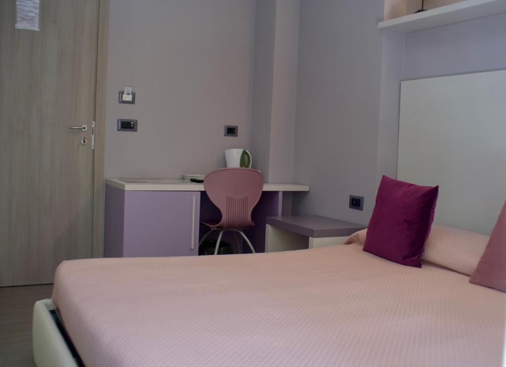 Postel nebo postele na pokoji v ubytování Real Rooms Dalia