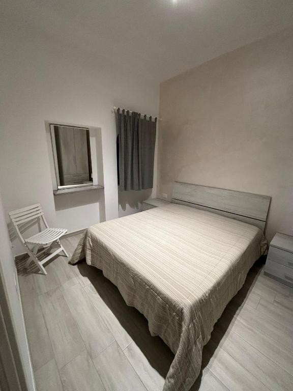 Postel nebo postele na pokoji v ubytování Bianca Appartamenti Bilocale