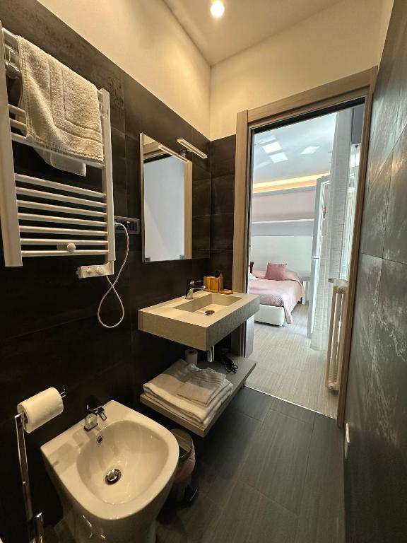 Koupelna v ubytování Real Rooms Dalia