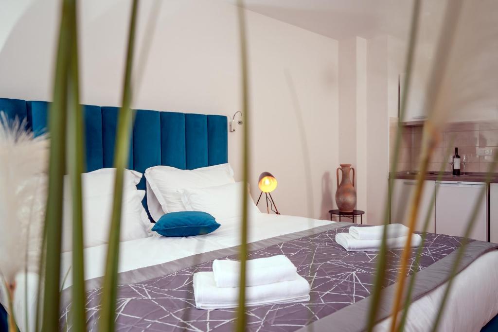 Кровать или кровати в номере Hotel SOL