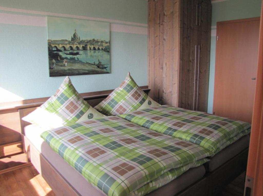 Ένα ή περισσότερα κρεβάτια σε δωμάτιο στο Gästezimmer zum Sonnenhof