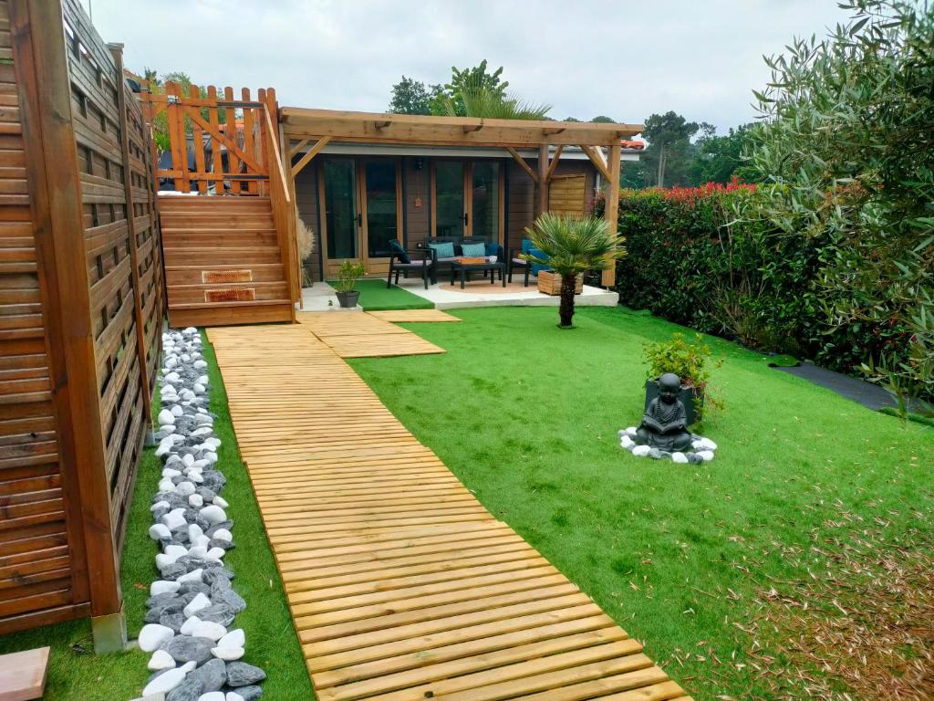Κήπος έξω από το Chalet vacances avec jardin près d'Arcachon 2 personnes