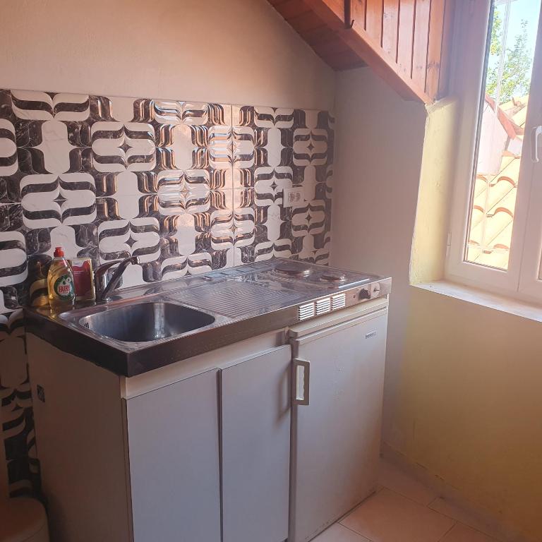 Kuchyň nebo kuchyňský kout v ubytování Belvedere Zakynthos Studios