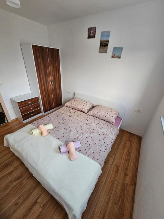 Postel nebo postele na pokoji v ubytování Apartments Lara