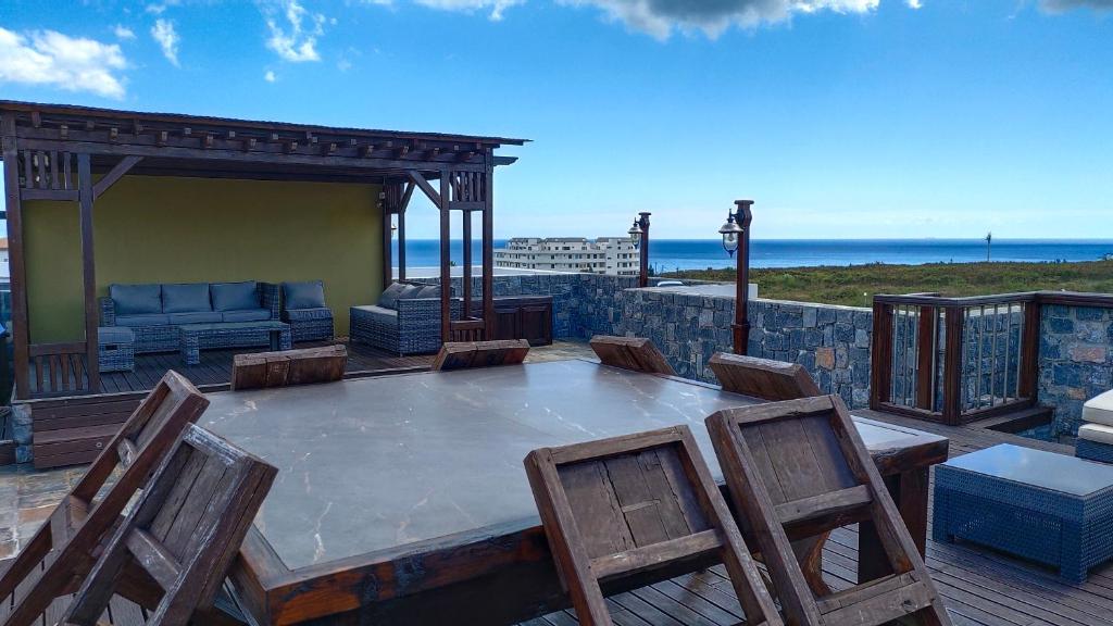 View of A private rooftop estate above Condado. Positioned within a boutique ...