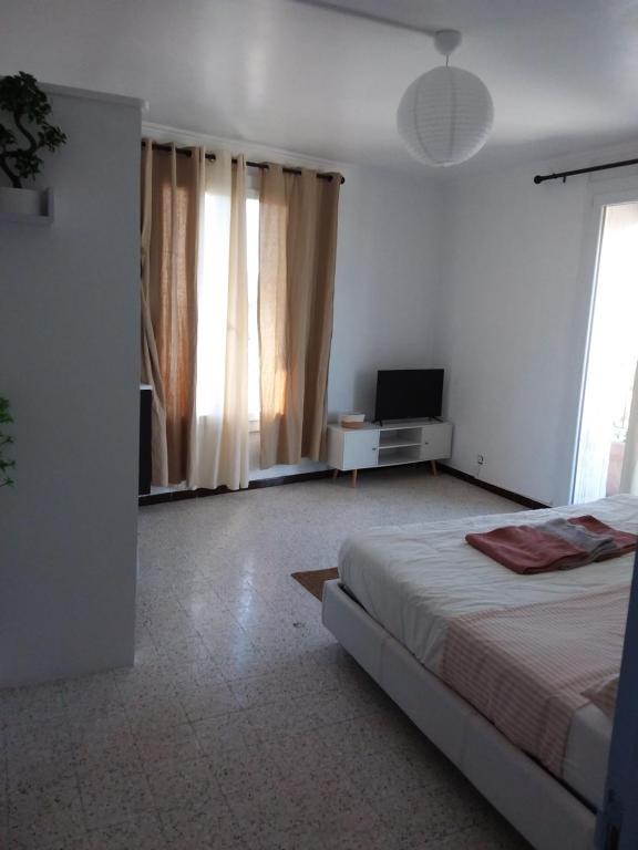 Postel nebo postele na pokoji v ubytování Ogooué appartement entier Lumineux 94m2 maxi 6 couchage 3 chambres
