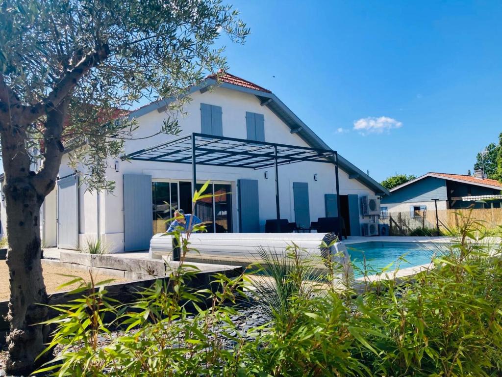 Πισίνα στο ή κοντά στο Chai Nous - votre villa au cœur des Landes - classée 4 étoiles