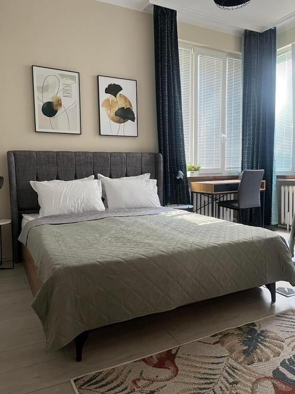Postel nebo postele na pokoji v ubytování EL apartment
