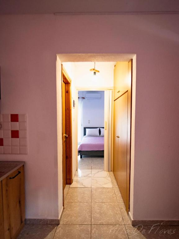 Postel nebo postele na pokoji v ubytování Villa De Flores