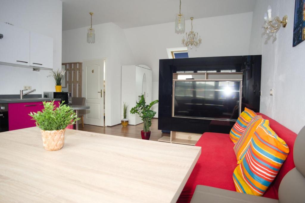 Kuchyň nebo kuchyňský kout v ubytování Appartement Dominik