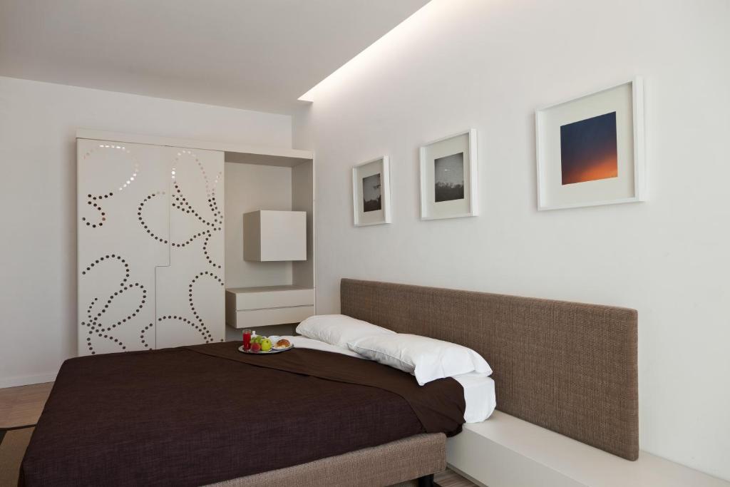 Postel nebo postele na pokoji v ubytování Hotel La Conchiglia