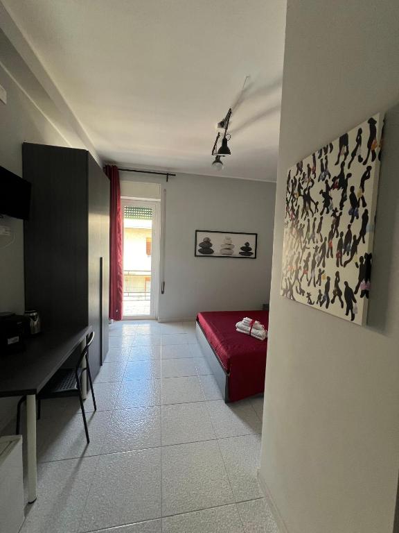TV a/nebo společenská místnost v ubytování Settetrequattro Rooms