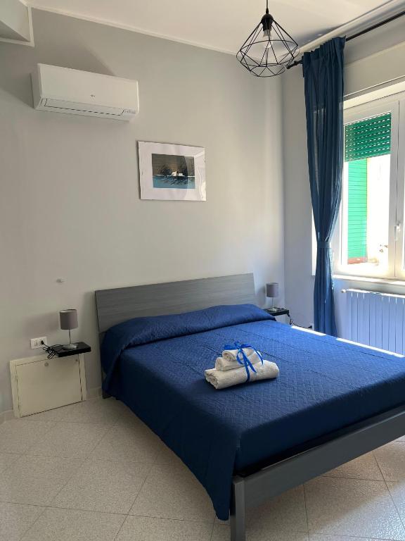 Postel nebo postele na pokoji v ubytování Settetrequattro Rooms