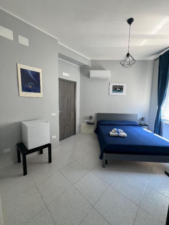 Postel nebo postele na pokoji v ubytování Settetrequattro Rooms