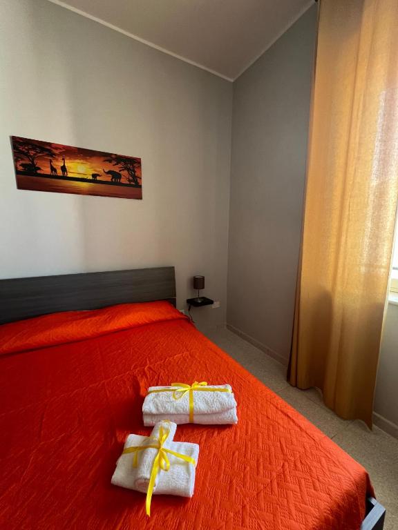 Postel nebo postele na pokoji v ubytování Settetrequattro Rooms