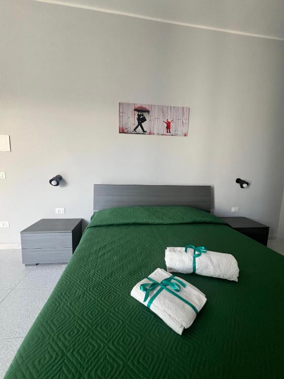 Postel nebo postele na pokoji v ubytování Settetrequattro Rooms