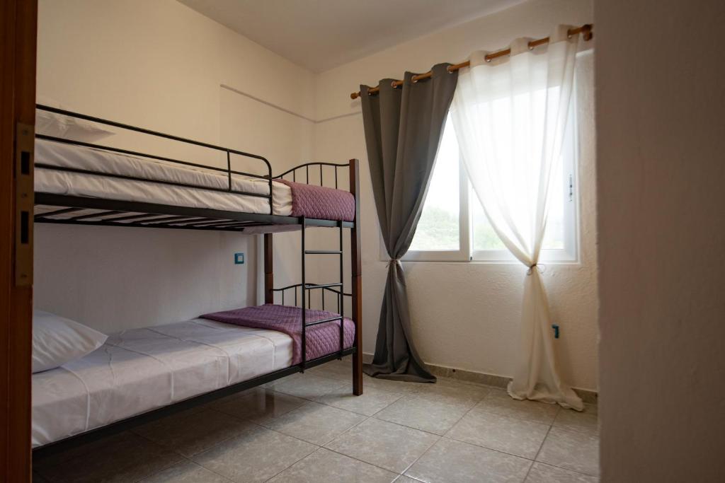Postel nebo postele na pokoji v ubytování Villa De Flores