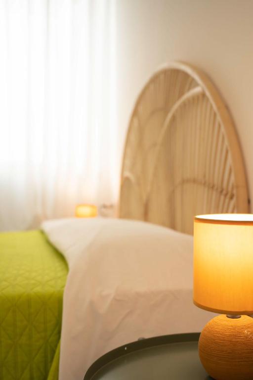 Postel nebo postele na pokoji v ubytování Aura Apartments