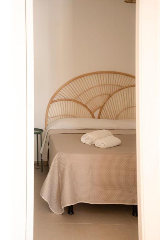 Postel nebo postele na pokoji v ubytování Aura Apartments