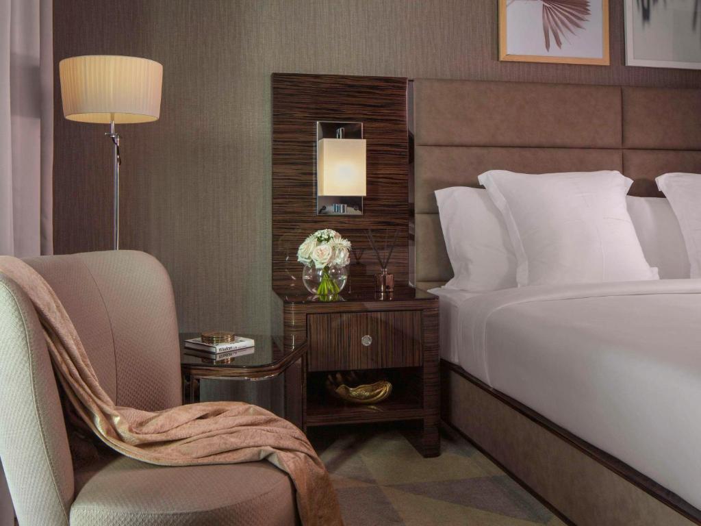 Postel nebo postele na pokoji v ubytování Hyde Hotel Dubai