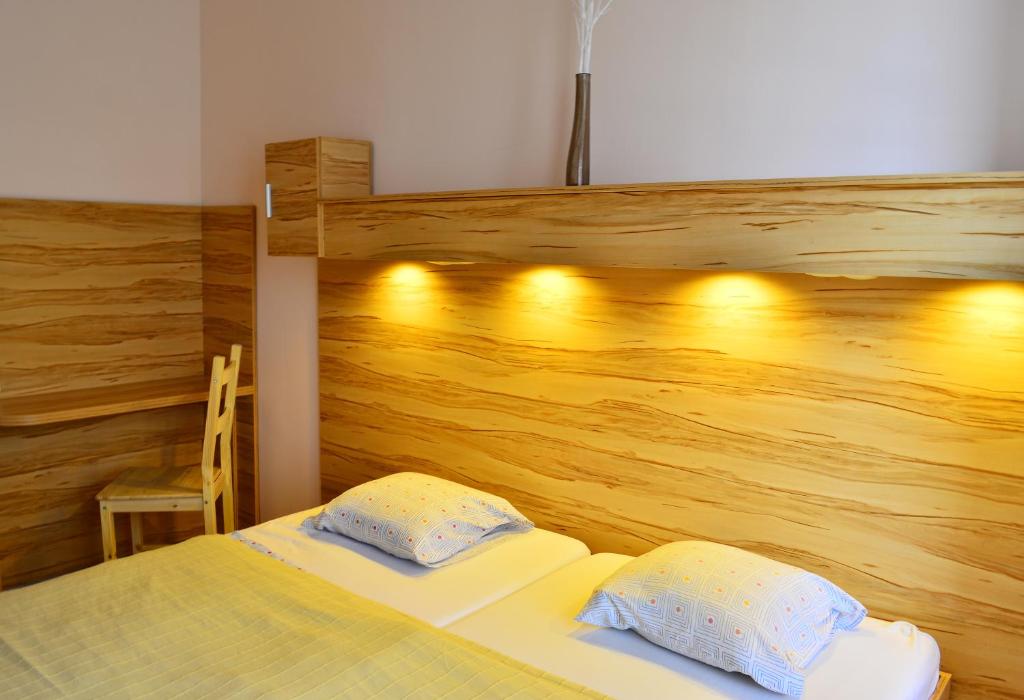 Posteľ alebo postele v izbe v ubytovaní Centrooms House