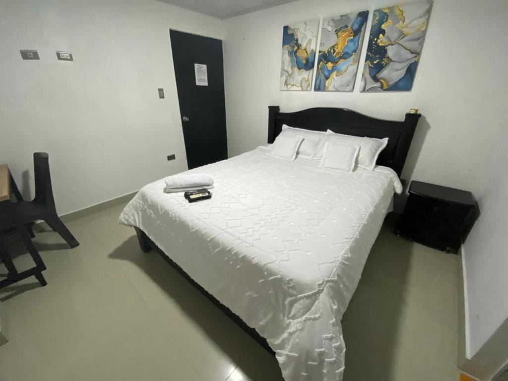 Postel nebo postele na pokoji v ubytování HOTEL LIGHT PLAZA