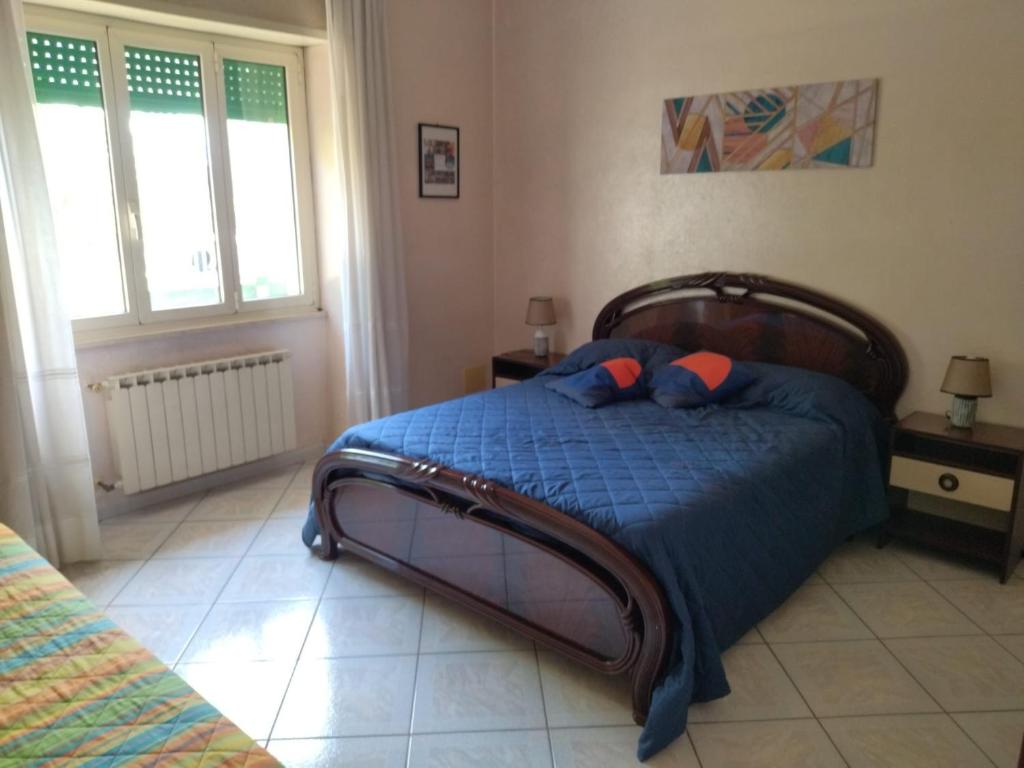 Postel nebo postele na pokoji v ubytování Appartamento vicino al mare con parcheggio