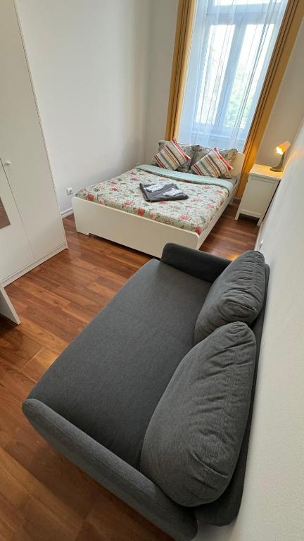 Predel za sedenje v nastanitvi Home Vibes