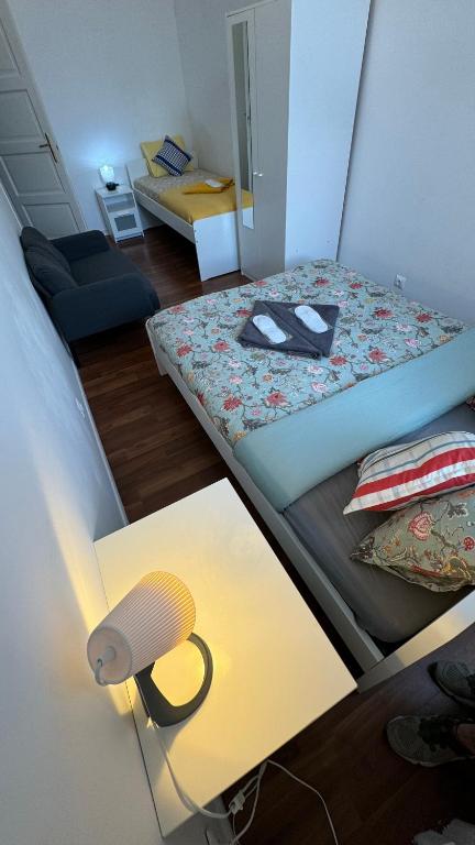 Postelja oz. postelje v sobi nastanitve Home Vibes