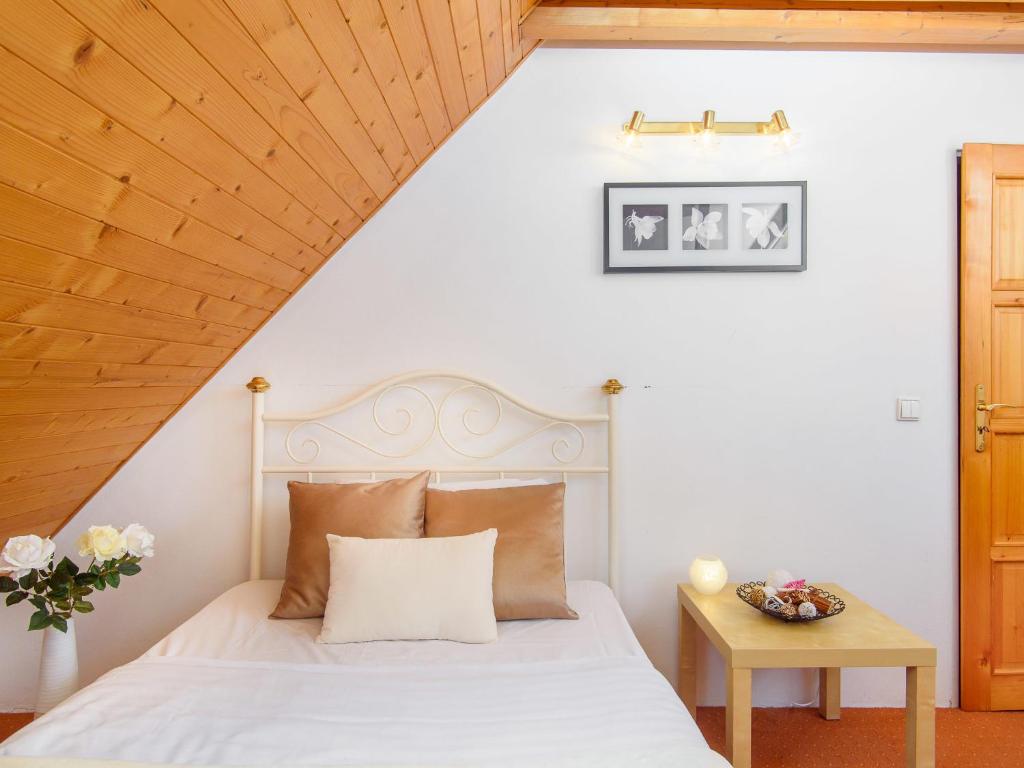 Postel nebo postele na pokoji v ubytování Hotel BELLA