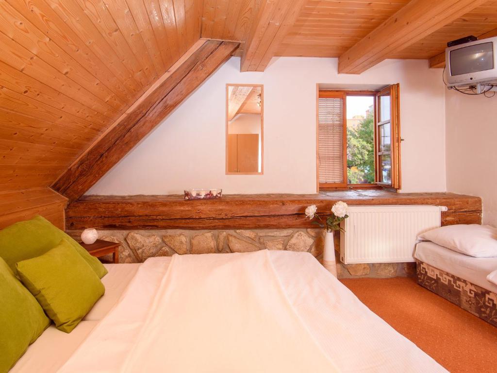 Postel nebo postele na pokoji v ubytování Hotel BELLA