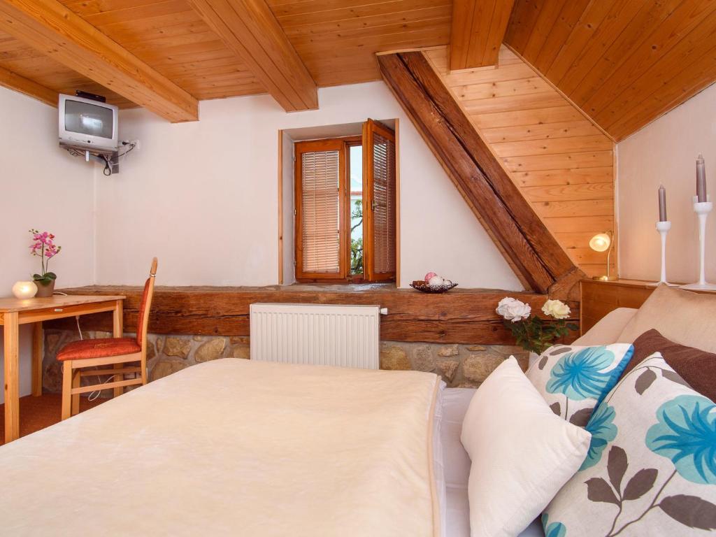 Postel nebo postele na pokoji v ubytování Hotel BELLA